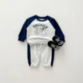 Details van schattige cartoon hond print baby peuter sweatshirt en joggingbroek herfst set. - Tops / 73cm / Schattige honden set