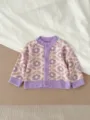 Gilet en tricot pour bébé avec motif de fleurs rétro, violet à manches longues boutonnées. - 66cm / Violet