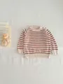 Infant striped knitted sweater detail, casual round neck with shoulder buttons, cozy fabric. - Apricot Coffee Striped