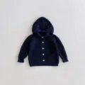 Detailed view of dark blue baby knit hooded cardigan with cute bear ears and white buttons. - 66cm / Sapphire Blue