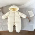 Infant winter down jumpsuit detail, cozy hooded baby snowsuit with front zipper closure. - 66cm / Apricot