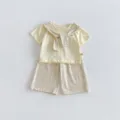 Infant girls summer two-piece outfit detail, yellow tee with striped shawl and shorts. - 73cm / Yellow