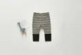 Baby striped cotton leggings detail showing the black and white pattern and cuff design. - 80cm / Black & White Stripes