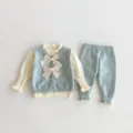 Knitted baby girl 3-piece set featuring a cute vest, ruffled base shirt, and matching pants. - 66cm / Set / Blue