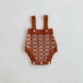Knit baby romper featuring geometric patterns, straps and front buttons, cozy winter infant clothing. - 66cm / Brown Rompers