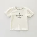 Toddler girl solid color short sleeve t-shirt with lettuce trim and cute chest print. - 66cm / Off White