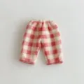 Detailed shot of cute pink and white plaid fleece baby pants with soft sherpa lining. - 73 / Bottoms / Pink and White Plaid