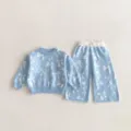 Close-up detail of cute girls knit sweater and bow pants set in light blue color. - 73cm / Set / Blue