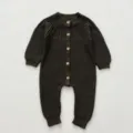 Detailed view of baby knitted romper in dark green with wooden buttons and cozy long sleeves. - 80cm / Army Green