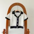 Infant knit cardigan top featuring short sleeves, fine-knit hollow design, and contrast collar. - 66cm / Black