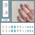 Blue and white press-on nails with cute cartoon cat tiger design and full set display. - Blue White Cartoon Cat Tiger Style (Y-07) / Glue Type
