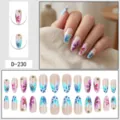 Detailed view of handmade press-on nails featuring floral art and metallic bead accents. - Nude Pink Blue Floral Paint Metal Bead (D-230)