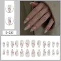 Handmade press-on nails detail showing exquisite red bow and sparkling rhinestone accents. - Red Hand Painted Bow Rhinestone (D-233)