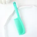 Cute mint green hair comb with cartoon dinosaur handle, portable plastic straightening comb for daily use. - Cartoon Animal Comb / 1 Piece / Green Dinosaur