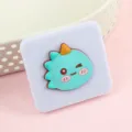 Cute foldable pocket makeup mirror with green cartoon dinosaur design for daily travel use. - Cute Makeup Mirror / Little Dinosaur