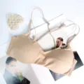Nude seamless wireless bra with thin multi-way cross straps for charming back display. - 70B / Tops / Nude