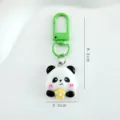 Porte-clés panda mignon avec fermoir en métal vert et pendentif en résine dessin animé. - Panda à fleurs