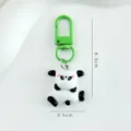 Porte-clés panda mignon dessin animé avec fermoir en métal vert, joli pendentif de sac et cadeau - Panda couché