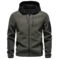 Detailed view showing the sleeve zipper pocket and contrast hood of the warm fleece jacket. - S / Tops / Army Green