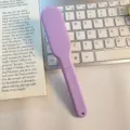 Brosse à cheveux pliable portable en lilas clair, brosse démêlante de voyage pour usage quotidien. - Peigne Pliant Minimaliste / Violet
