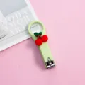 Leuke groene cartoon kersen nagelknipper, stijlvolle macaron kleur kinder manicure tool. - Kers