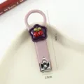 Cute pink metal nail clipper with purple star and red cherry decoration, 7.7cm portable size. - Cherry Cake