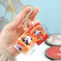 Suess chinesisches Neujahr Panda Wuerfel Schluesselanhaenger rote Umschlag Geschenk toll - Familienfest-Essen / Süßer Panda Zauberwürfel-Schlüsselanhänger