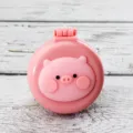 Portable folding air cushion hair brush with cute cartoon pig design for women daily use. - Pink Base Piggy