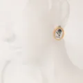 Aros ovalados de flor de nacimiento de enero chapados en oro de 18k en acero - Enero - Clavel