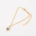 Pulsera minimalista de acero inoxidable chapado en oro 18K con dije de concha de Tauro - Tauro