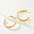 Close-up detail of trendy gold coiled hoop earrings featuring unique spring texture and square ends. - Large Hoop Rolled Spring Texture Earrings (Style 2)