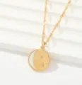 Detailed shot of gold celestial pendant necklace featuring sun, moon, and shimmering stars. - Smiley Face