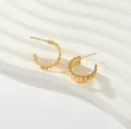 Exquisite gold hoop earrings with detailed textured scalloped design, perfect for elegant daily wear. - Wavy Edge Semicircle Earrings (Style 4)