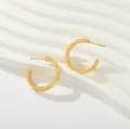 Minimalist gold hoop earrings detail shot, sleek geometric design for women jewelry daily wear. - Smooth Round Hoop Earrings (Style 6)