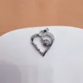 Heart-shaped volleyball pendant with cubic zirconia inlay, stylish sports jewelry item. - Heart Hollow Volleyball (18K Gold)