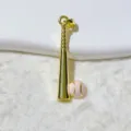 Detail shot of a gold baseball bat and pink ball pendant charm for DIY jewelry making accessories. - Gold and Pink Ball Style