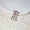 Detailed close-up of a sparkling pink zircon butterfly tassel pendant for DIY jewelry. - Silver With Pink Zirconia / Silver