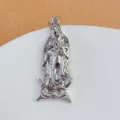 Close-up detail of silver religious idol pendant with exquisite metal carving craftsmanship. - Virgin Mary Figure (6)
