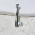 Close-up detail of silver baseball bat and ball pendant jewelry accessory pendant piece. - Silver and Bicolor Ball Style