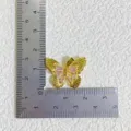 Detailed view of gold plated butterfly pendant with pink and white zirconia stones for DIY jewelry. - Gold Butterfly Textured Style (4)