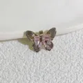 Exquisite butterfly pendant jewelry accessory with pink cubic zirconia, detailed close-up shot. - Silver Butterfly Pink Rhinestone Style (3)