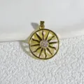 Close up view of the exquisite gold plated sun pendant sparkling with cubic zirconia stones. - Gold
