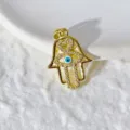 Ciondolo mano di Hamsa occhio malvagio dorato accessorio gioielli fai da te elegante - Stile Mano Di Fatima Con Occhio Blu E Zirconi (xz422-11) / Oro