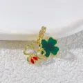 Gold-plated double four-leaf clover pendant charm with green enamel and a cute red ladybug accent. - Double Four Leaf Clover with Red Ladybug (2)