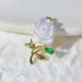 Exquisite white rose pendant with gold stem and green stone, perfect for DIY jewelry making. - Iridescent White Rose (7)