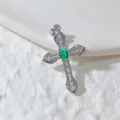 Silver tone cross pendant necklace featuring green and white cubic zirconia crystals. - Silver Cross Green Oval Rhinestone Style (13)