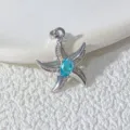 Detailaufnahme des blauen Seestern-Anhängers, minimalistischer vergoldeter Modeschmuck. - Blaue Stein Seestern 2 (TD00087-10)