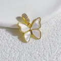 Wunderschöner Schmetterlingsanhänger mit weißer Perlmutteinlage und Zirkoniasteinen. - Gold Eingelegt Weiß Perlmutt Schmetterling Stil