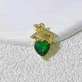 Close-up of a gold graduation cap pendant with a green heart stone and shiny cubic zirconia. - Gold-Green Heart