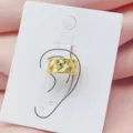 Gold plated woven ear cuff minimalist non piercing clip on earrings for women daily wear - Crisscross Weave Hollow Style